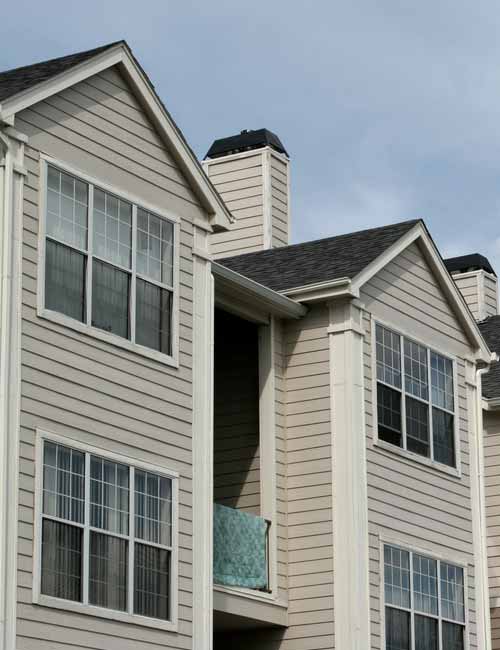 Apartment with beige siding